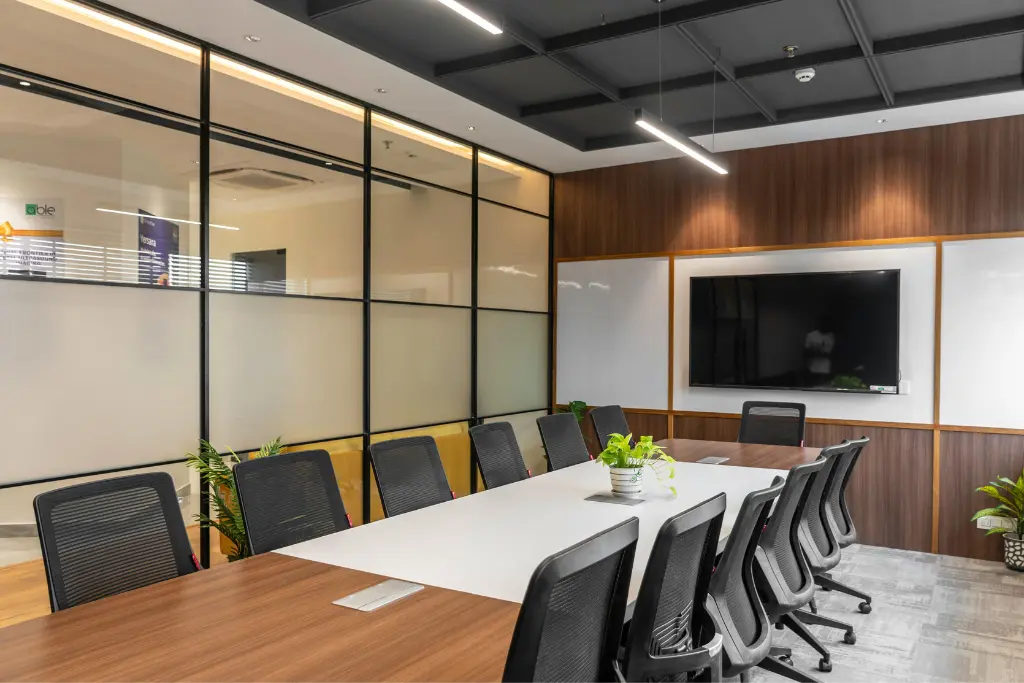 Modern office workspace with clean layout, ergonomic seating, and lighting designed for productivity