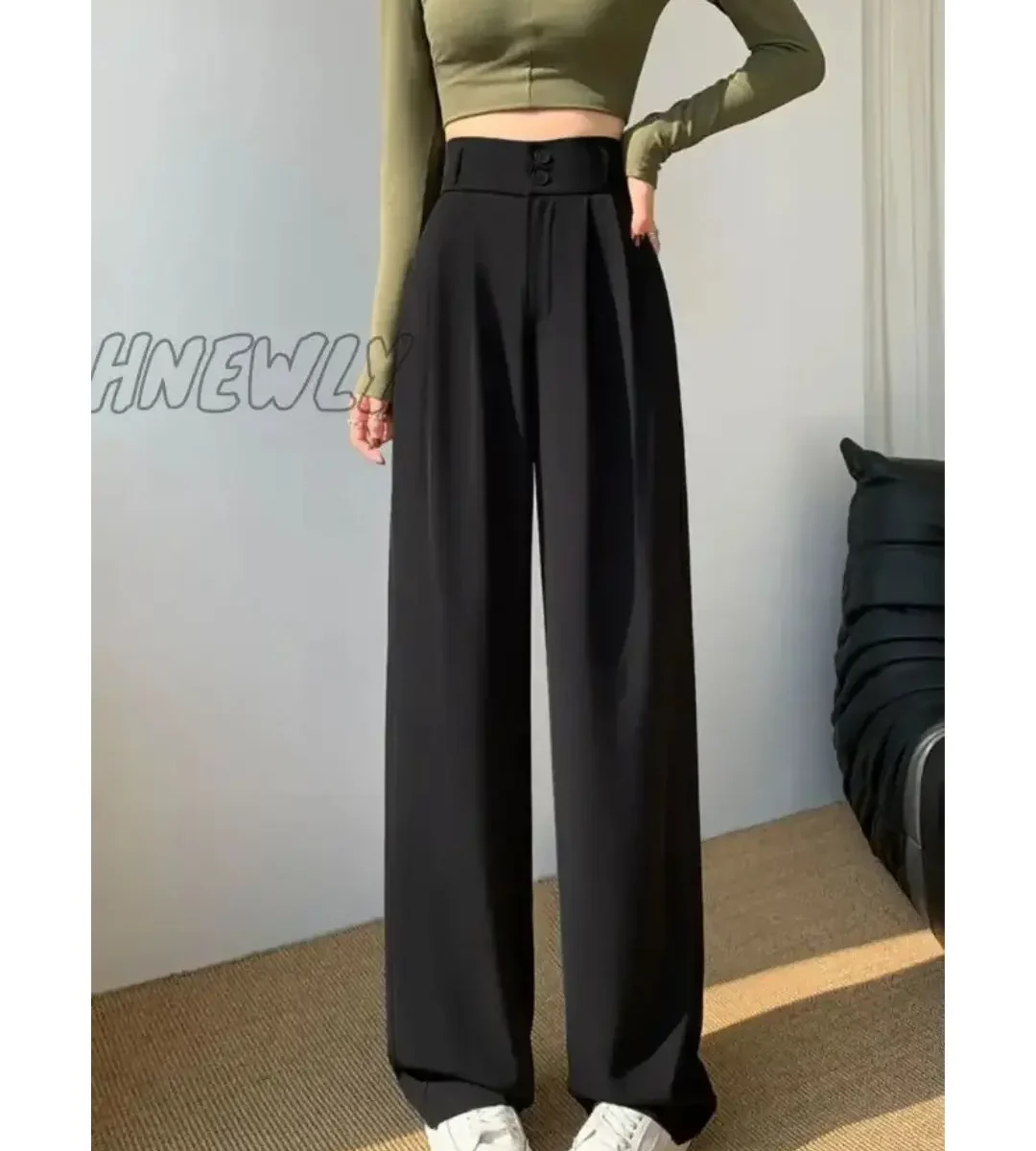 Black high-waisted wide-leg trousers with pleated front and relaxed fit